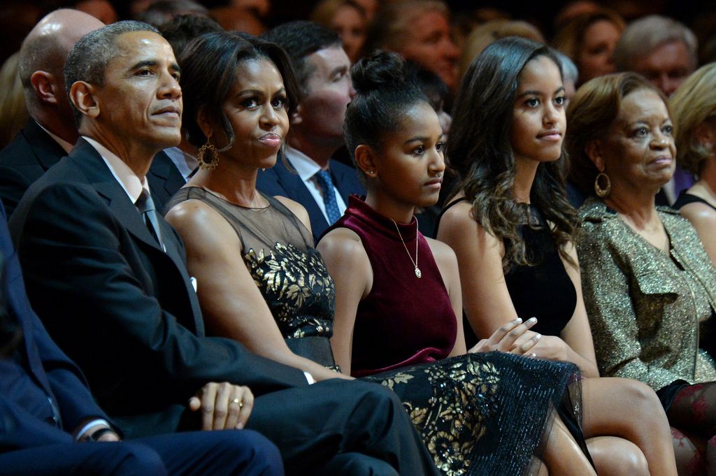 President Barack Obama, First Lady Michelle Obama, Sasha Obama, Malia Obama, and Marian Shields Robinson attend TNT Christmas in Washington 2014 