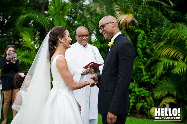 Jay Blades and Lisa Zbozen look adoring at each other in wedding photos