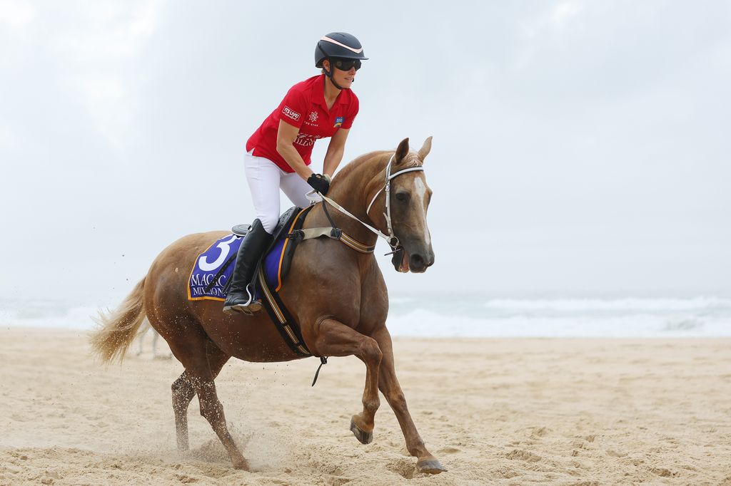 Zara Tindall riding horse on beach