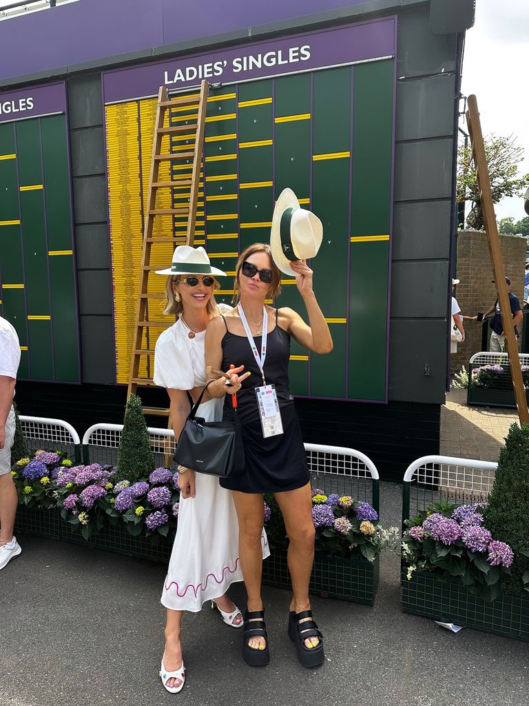 Vogue in a white dress at Wimbledon with joanne in black dress