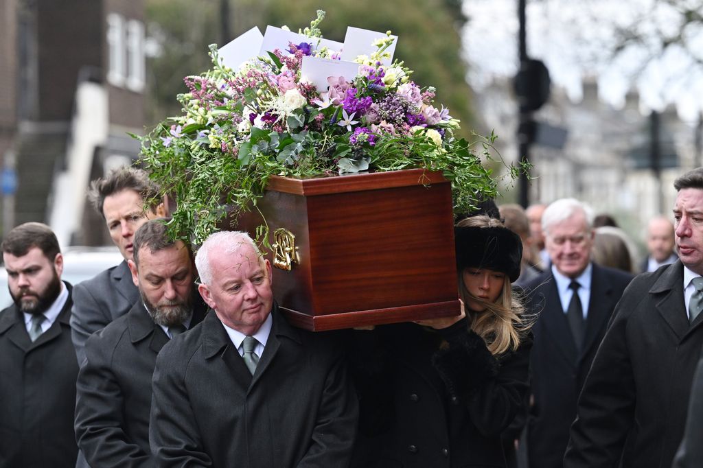 Darcey Draper carried her father's coffin into the church