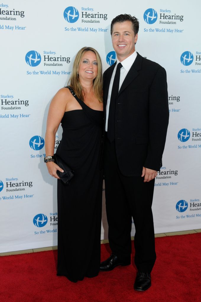 Doug and Lisa Pitt in black attire