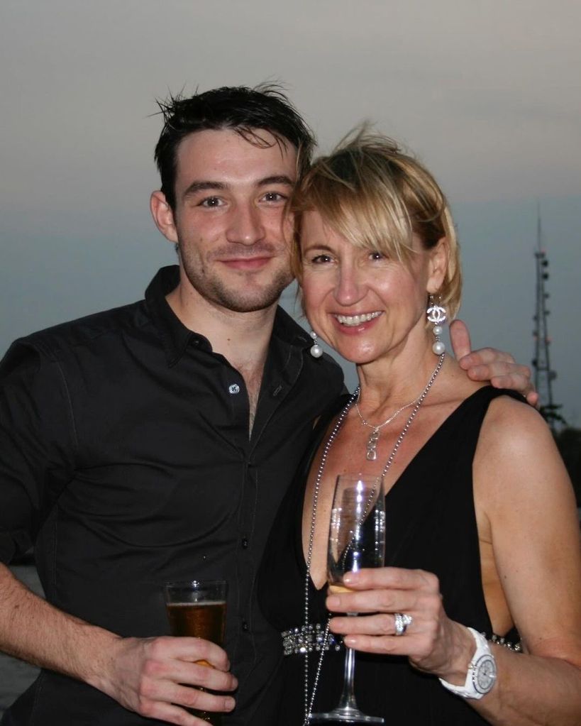 Carol McGiffin in a black dress with her husband Mark 