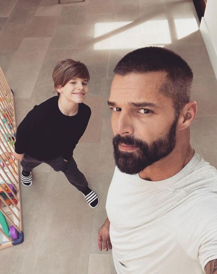 Ricky Martin with son Matteo by a crib