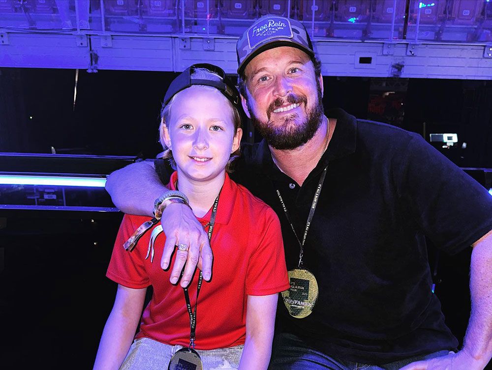 Cole Hauser with his daughter Steely at a Drake concert in Miami 