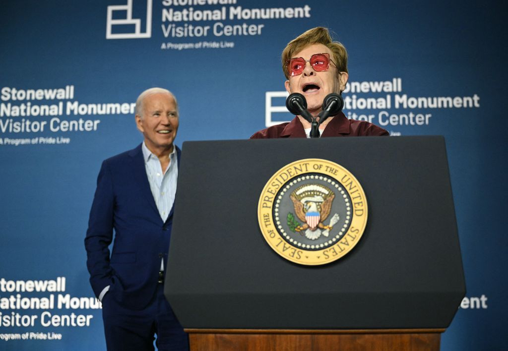 British musician Elton John speaks as US President Joe Biden looks on during the Stonewall National Monument Visitor Center grand opening ceremony