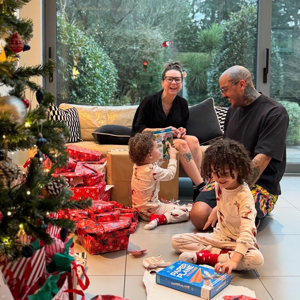 Photo of Danny Jones' relatives in the sitting area of their new home at Christmas time
