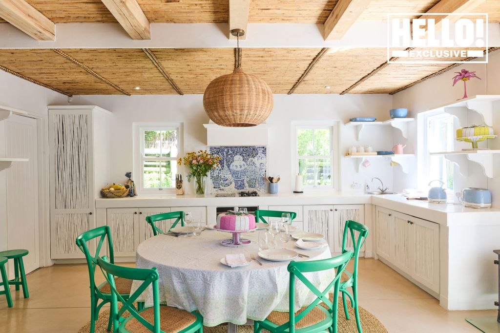 Tabitha Webb beautiful kitchen at South Africa home with circular table and green chairs