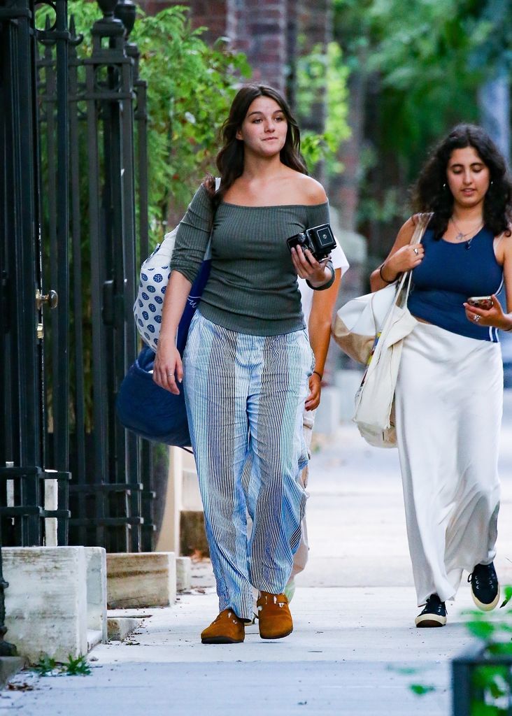 Suri Cruise, now Suri Noelle, is all smiles while out and about in New York City with some gal pals.

