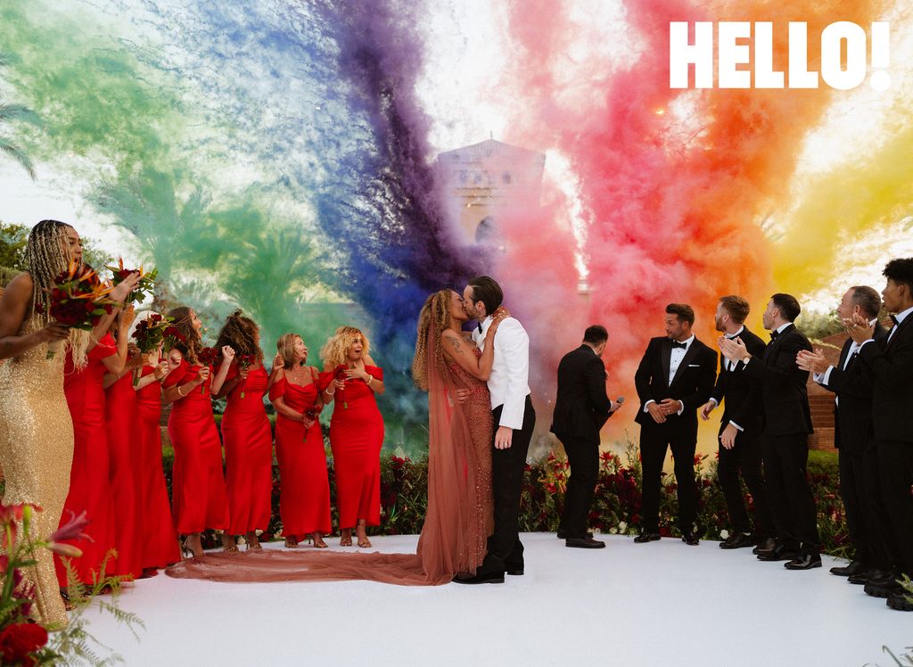 Mel B kissing husband Rory McPhee in front of rainbox explosion at Morocco wedding 