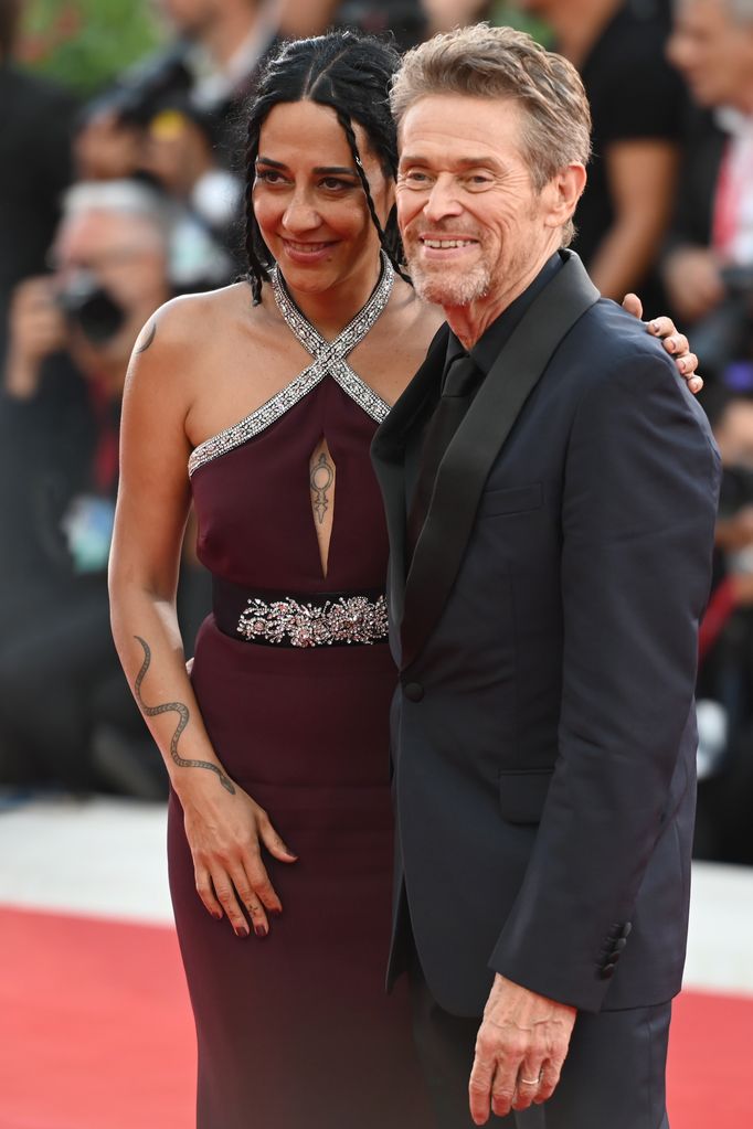 Willem Dafoe, a member of the cast of the opening film, accompanied by his wife Giada Colagrande, attends the opening of the 81st Venice International Film Festival with the film "Beetlejuice Beetlejuice".