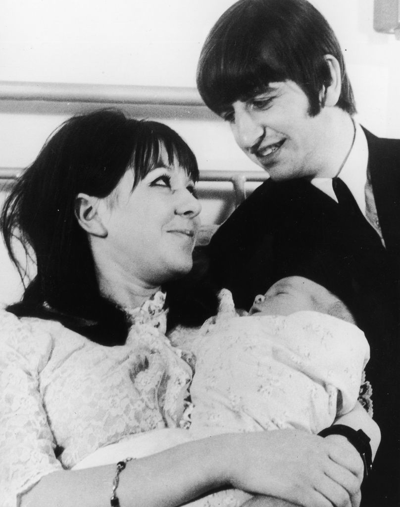 Man and woman with newborn baby