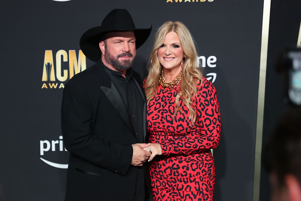 Garth Brooks and his wife Trisha Yearwood pose for picture during the 58th Academy of Country Music awards 