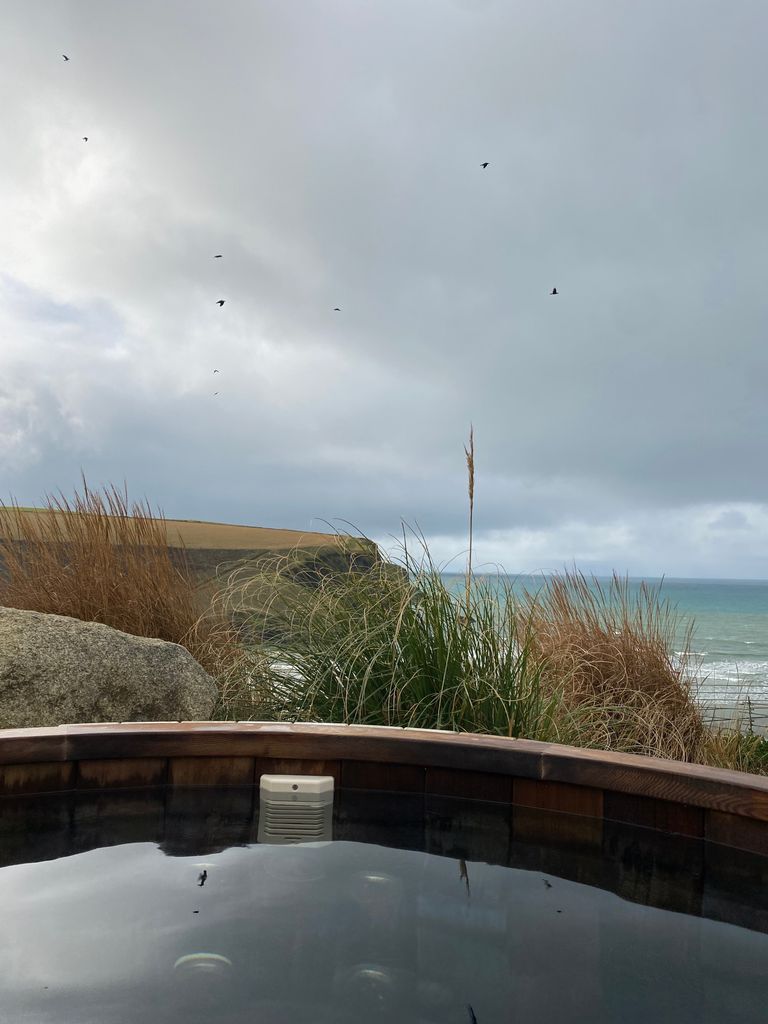 The view from the clifftop hot tub at The Scarlet
