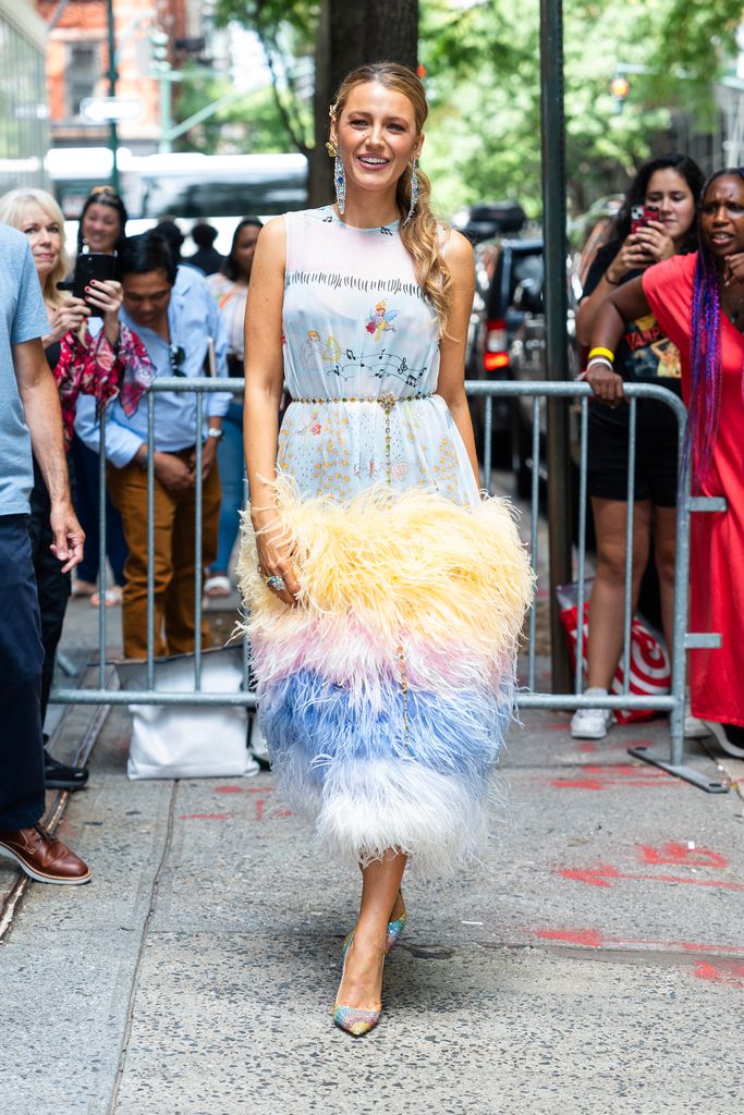 Blake Lively on street in rainbow dress