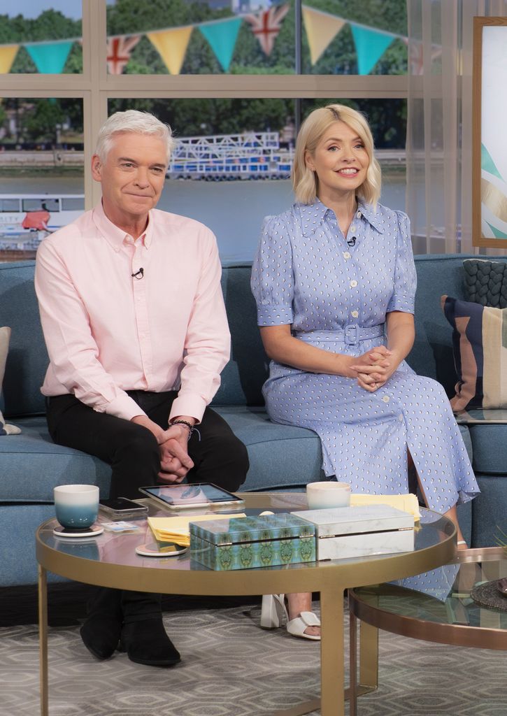 Phillip Schofield and Holly Willoughby sat on a sofa