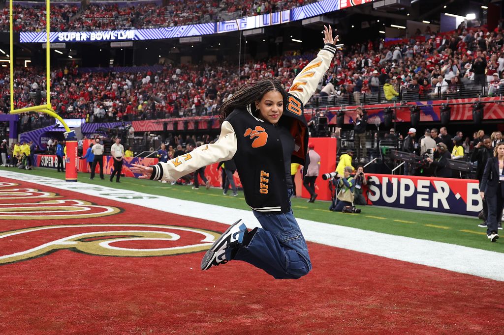 American Rapper Jay-Z's daughter, Blue Ivy Carter, reacts before Super Bowl LVIII between the San Francisco 49ers and Kansas City Chiefs 