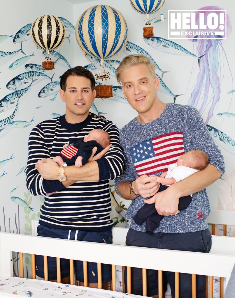 Ollie Locke and Gareth holding their babies in their arms