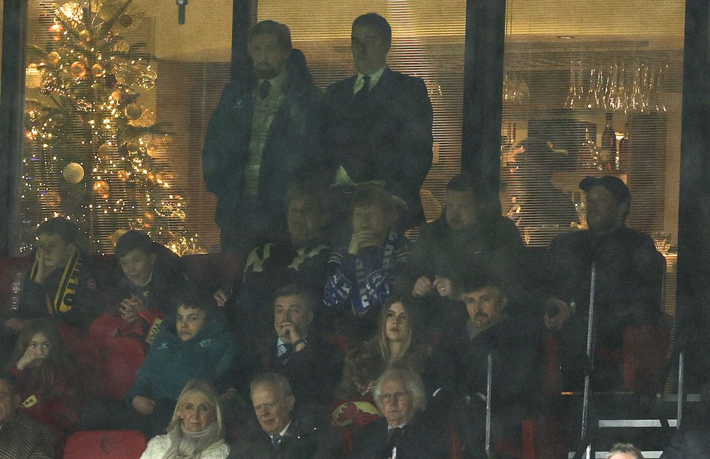 Elton's sons donned Watford scarfs for the match as they watch from the directors' box