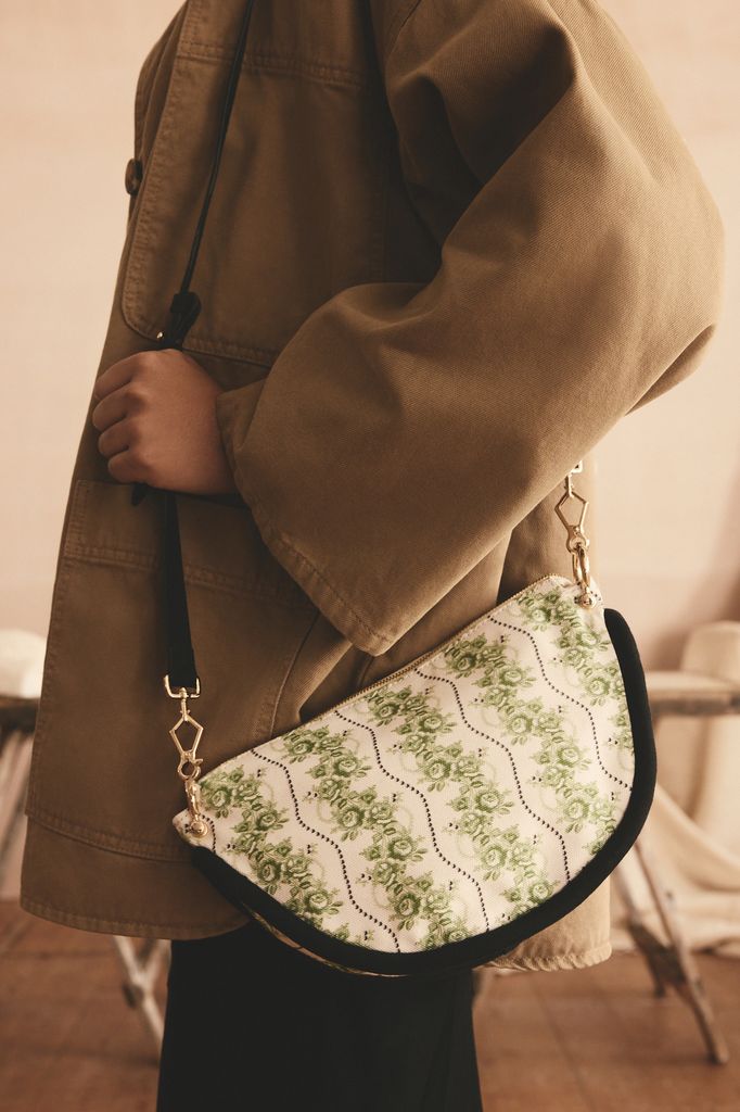 Cath Kidston green floral bag in half moon shape
