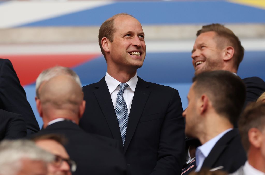 Prince William smiling in the crowd at England quarterfinal match