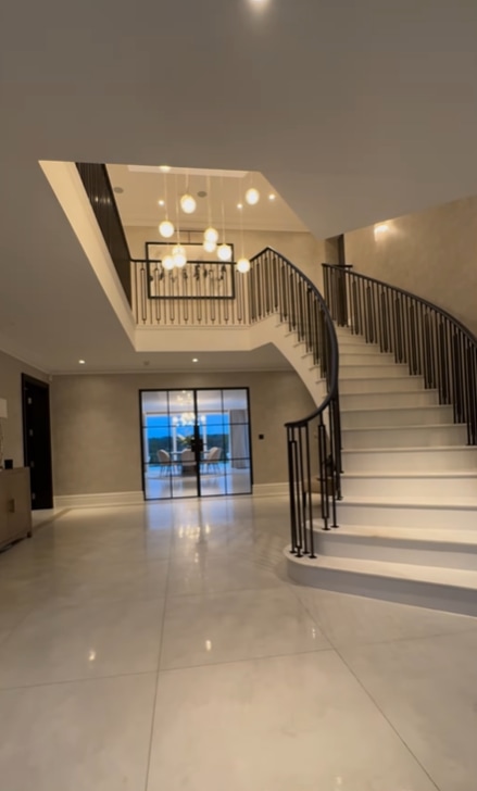 Mark and Michelle's large neutral hallway with stairs