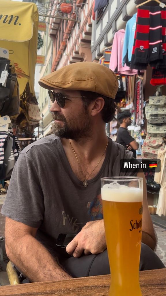 Manuel Garcia-Rulfo sits in front of a pint of beer in Germany