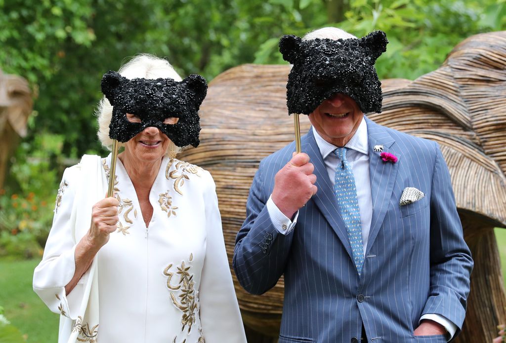 Camilla and Charles wearing animal face masks at Elephant Family Animal Ball, 2019