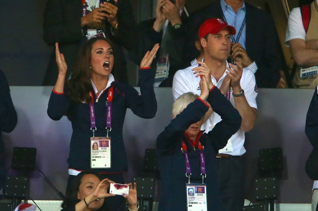 Catherine, Duchess of Cambridge and Prince William, Duke of Cambridge cheer on Mo Farah of Great Britain