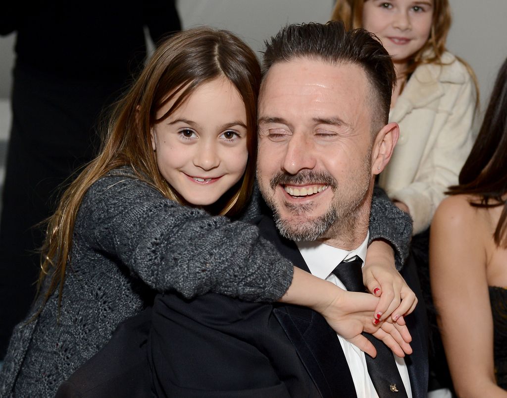 David Arquette with young Coco on his back
