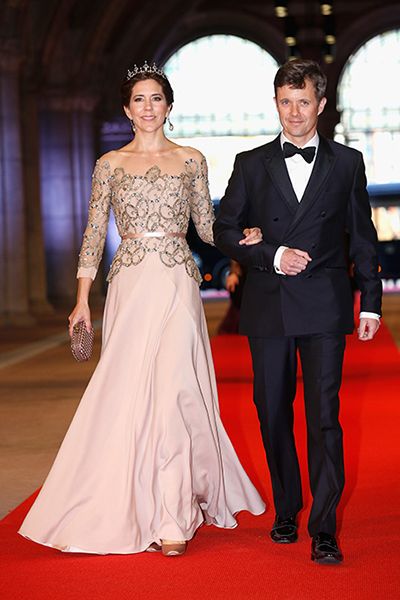 Crown Princess Marry and Crown Prince Frederik walking arm in arm