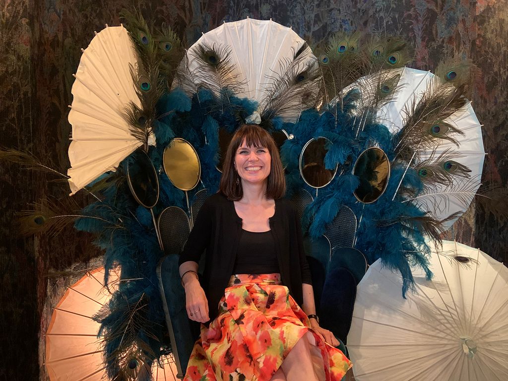 Photo of Ria Hopkinson sitting on peacock chair at luxury London venue, The Other House