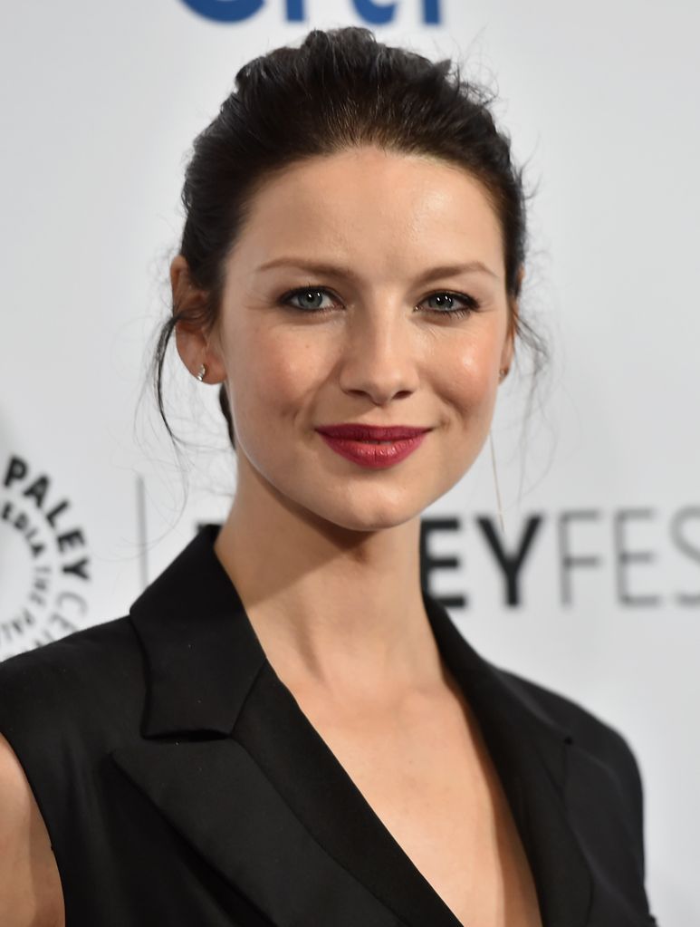 Caitriona wearing a black outfit 