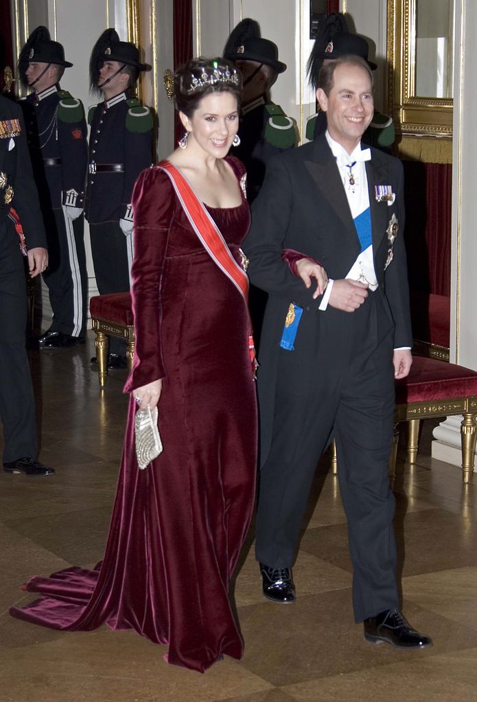 Crown Princess Mary and Prince Edward arm in arm in smart dress