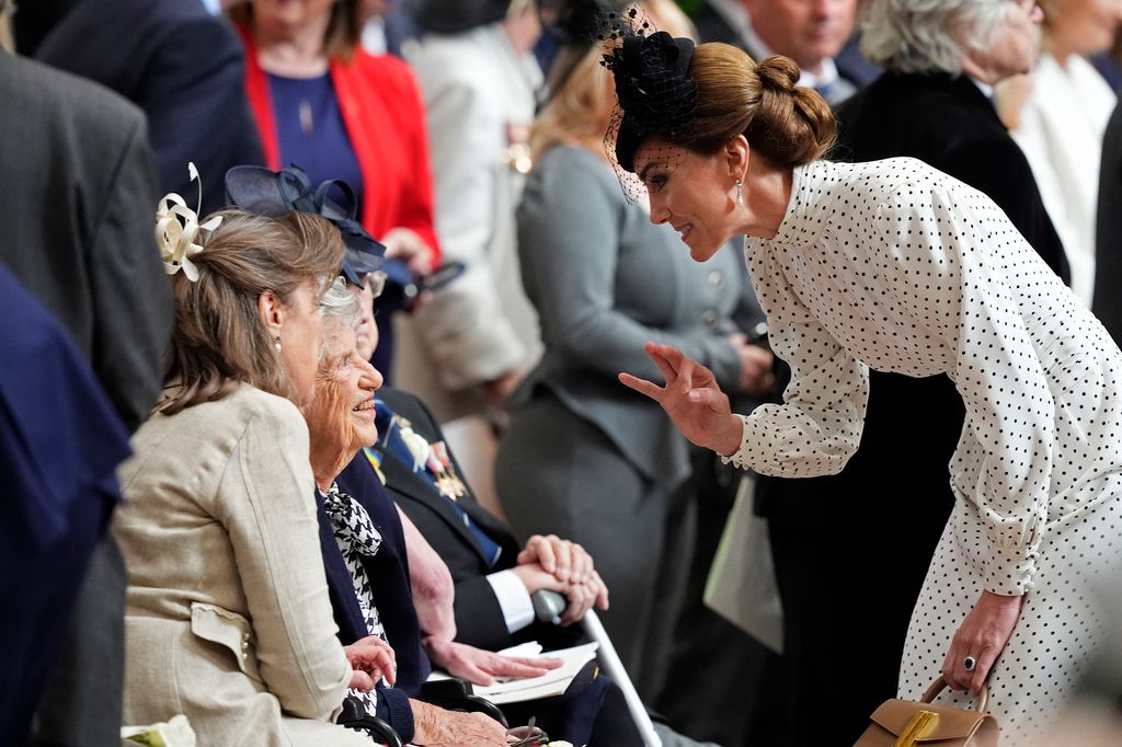 Princess of Wales speaks to a veteran as they leave a service of thanksgiving        
