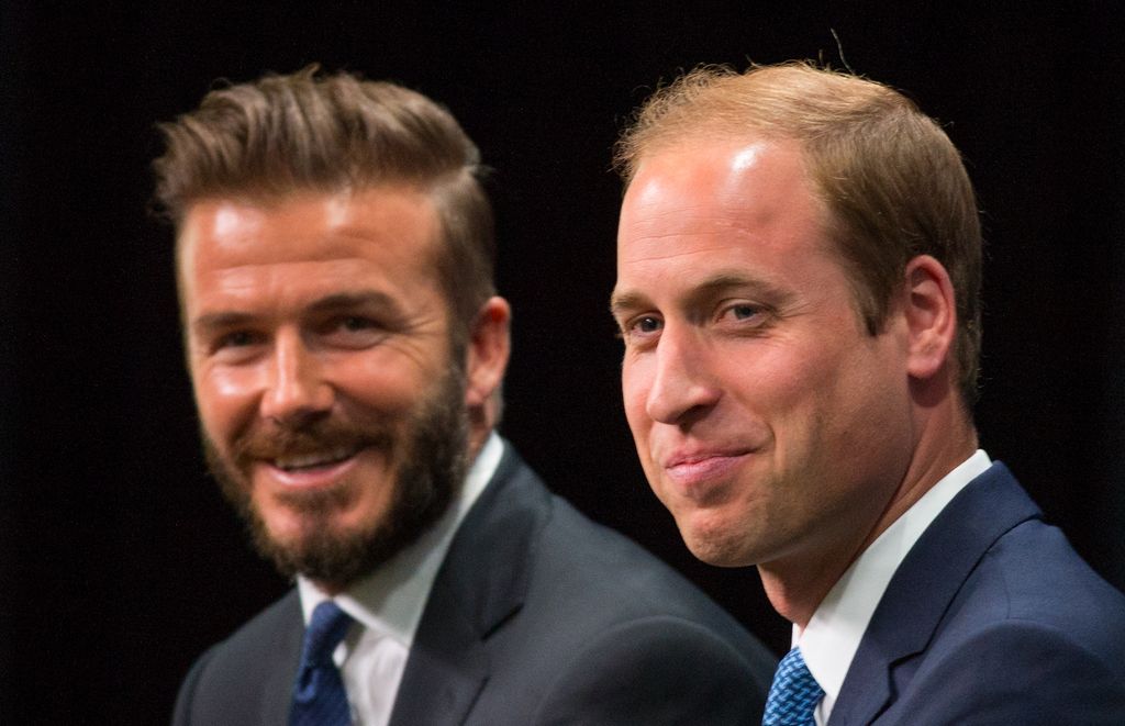 David Beckham and Prince William in front of a black background