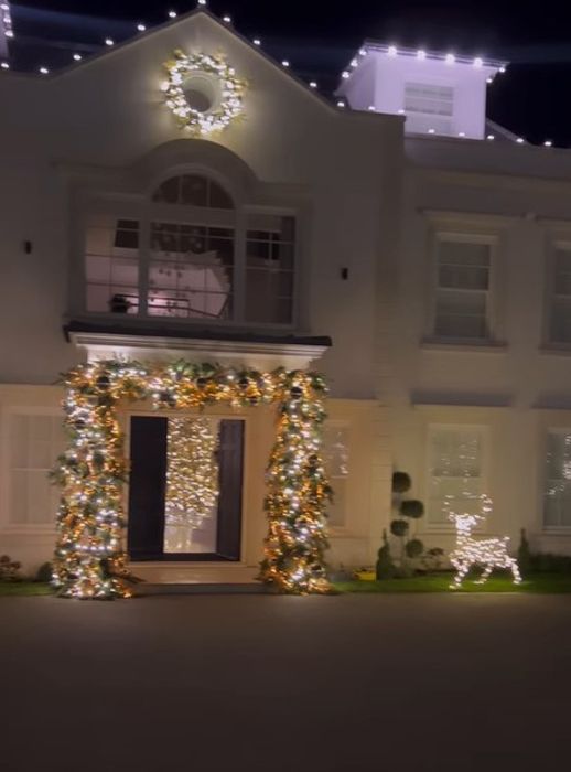 mark wright home exterior with christmas lights 