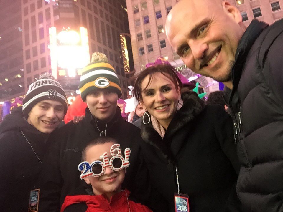 Victor Popovic takes a selfie with his wife and kids at Times Square in New York City, shared on Instagram