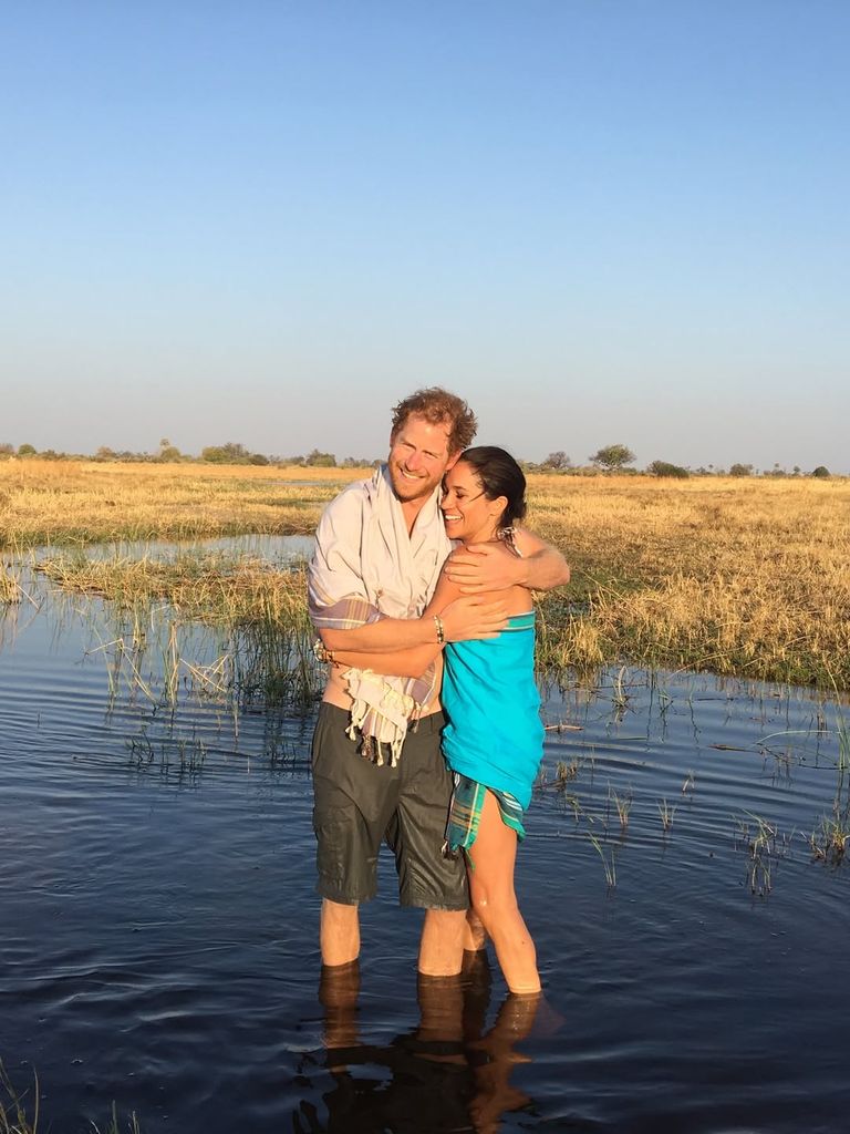Prince Harry and Meghan Markle pose for a picture in 2016 in Botswana