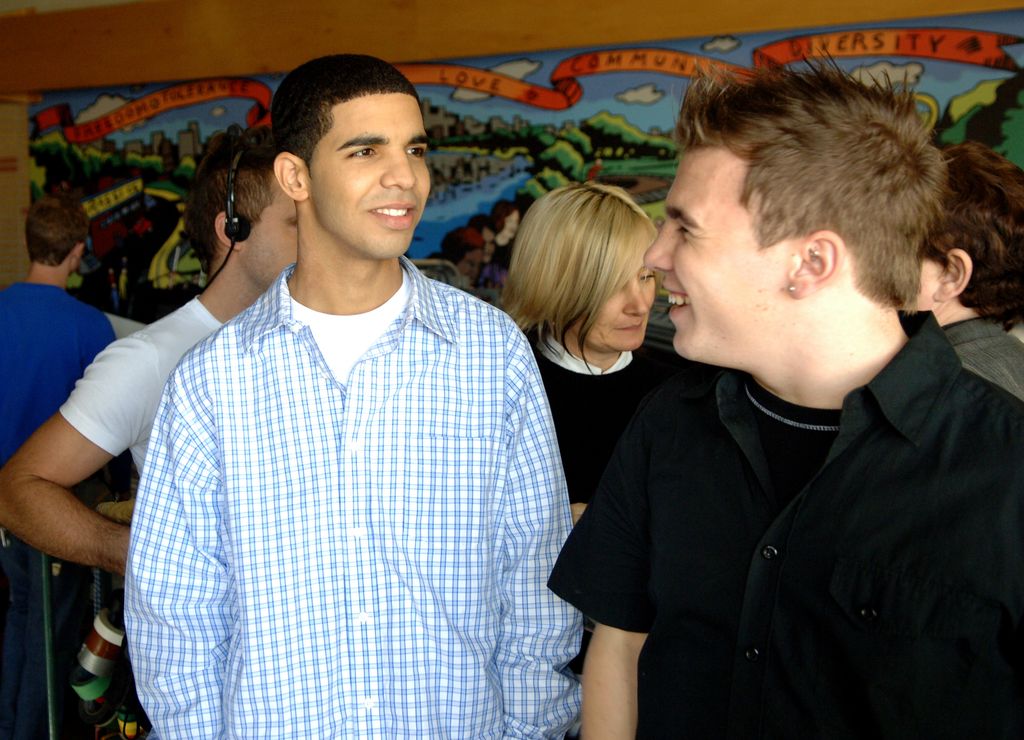 Aubrey "Drake" Graham (Jimmy) and Shane Kippel (Spinner) during "Degrassi: The Next Generation" Celebrates 100th Episode at Degrassi High School Set in Toronto, Ontario, Canada, 2006