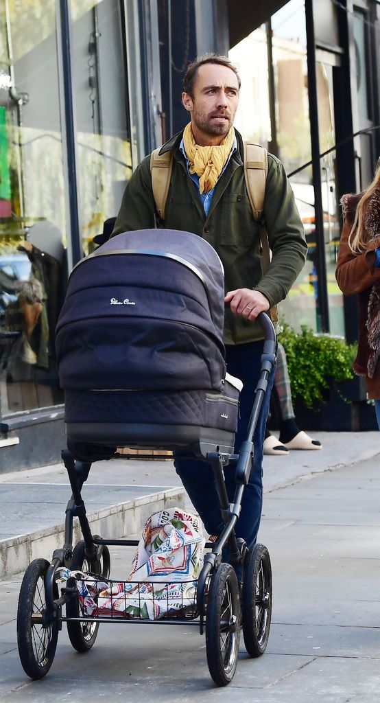 James Middleton pushing baby in stroller