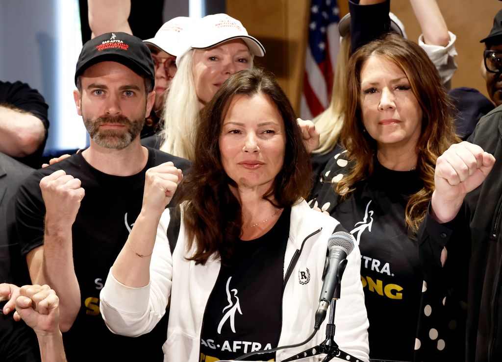 Ben Whitehair, Frances Fisher, SAG President Fran Drescher, Joely Fisher, National Executive Director, and SAG-AFTRA members are seen as SAG-AFTRA National Board holds a press conference for vote on recommendation to call a strike 