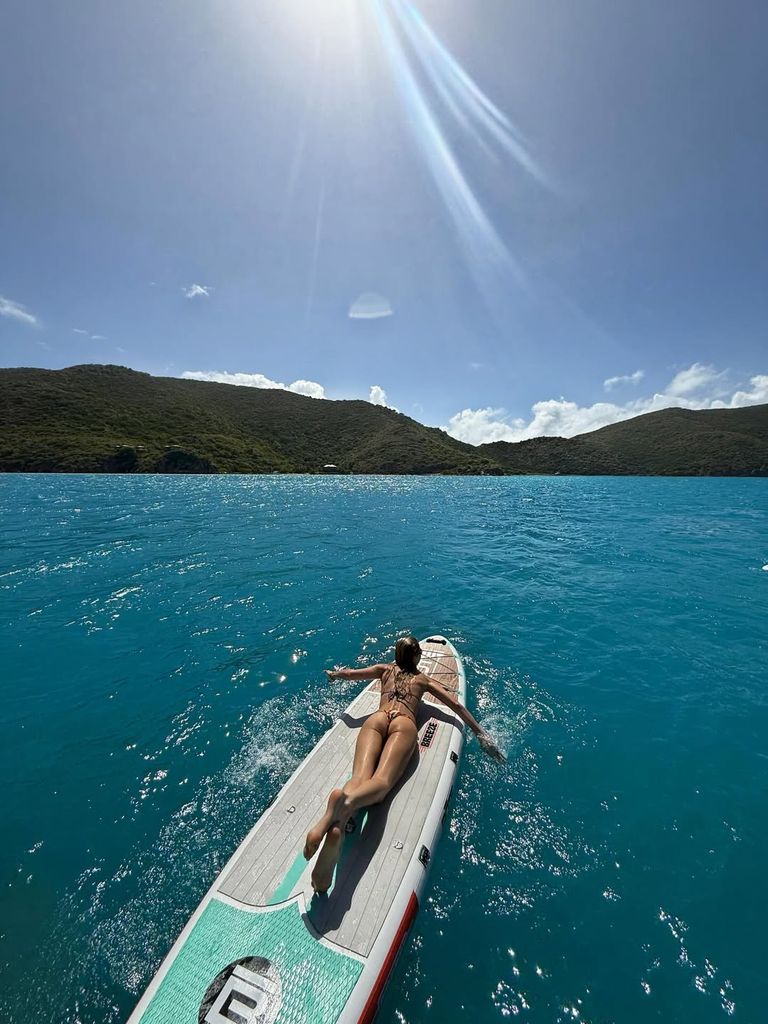 Paddling out on her yacht vacation
