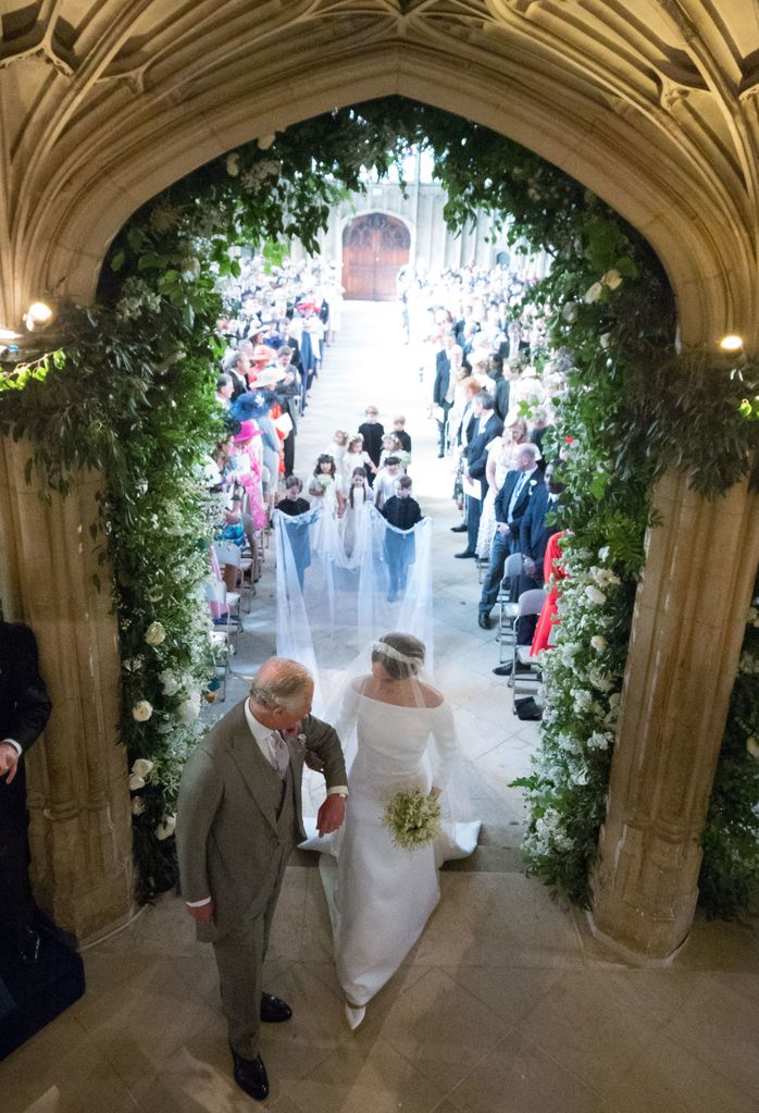 Meghan Markle walks up the aisle with King Charles at St George's Chapel
