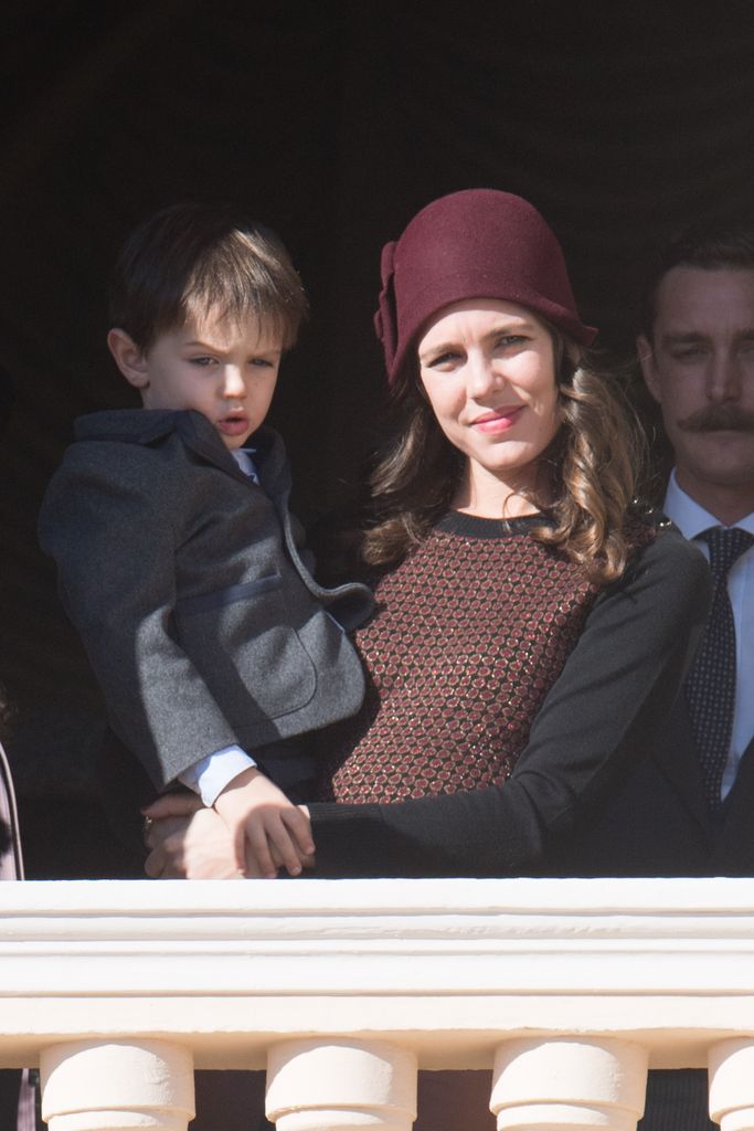 Charlotte Casiraghi and and her son Raphael Elmaleh greet the crowd from the palace's balcony 