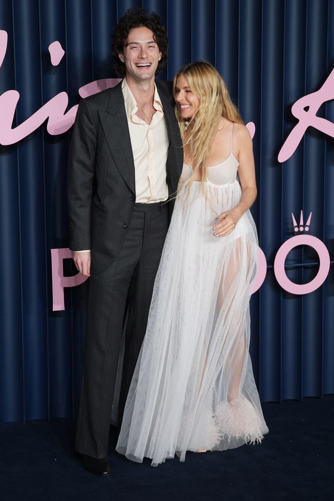 Oli Green and Sienna Miller attending the Fashion Awards 2025 at the Royal Albert Hall, London. Picture date: Monday December 1, 2025