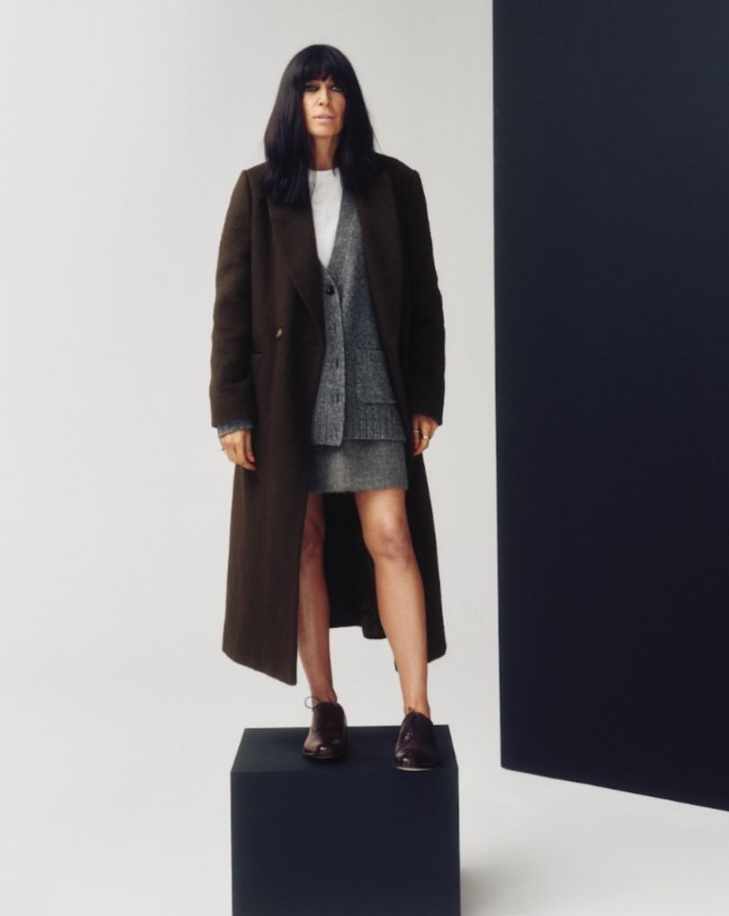 Claudia styled her coat with a cardigan and brogues