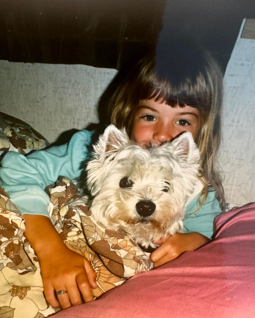 Gemma as a child with her childhood pup Fergie