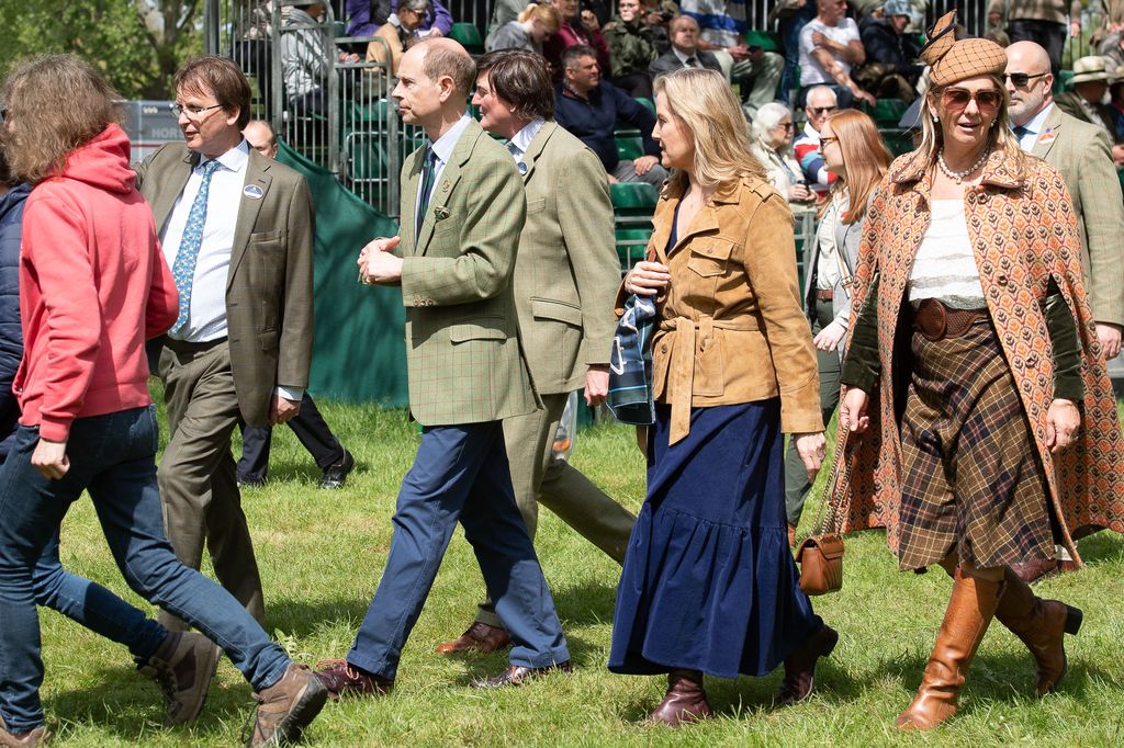 Sophie in a cord dress with Prince Edward and others