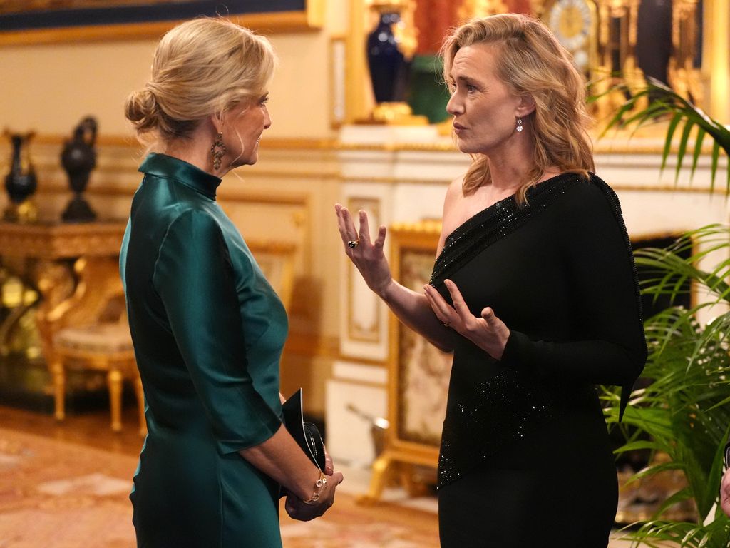 WINDSOR, ENGLAND - JANUARY 28: Sophie, Duchess of Edinburgh (left) speaks to Kate Winslet in the Grand Reception Room after they attended the premiere of Prime Video's Finding Harmony: A King's Vision, at Windsor Castle on January 28, 2026 in Windsor, England. The documentary outlines Charles' philosophy of harmony, which encourages people to see themselves as part of nature, not apart from nature, and will be available on Prime Video from Friday February 6. (Photo by Jonathan Brady - Pool/Getty Images)